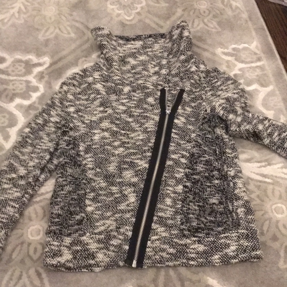 A sweater ( I do not know price )